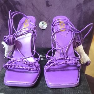 Purple string up heel